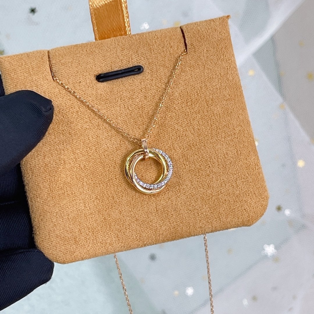 {
  "Elowen jewelsry": "Elowen ジュエリー",
  "TRINITY NECKLACE SILVER GOLD PINK GOLD DIAMONDS": "トリニティネックレス シルバー ゴールド ピンクゴールド ダイヤモンド"
}
