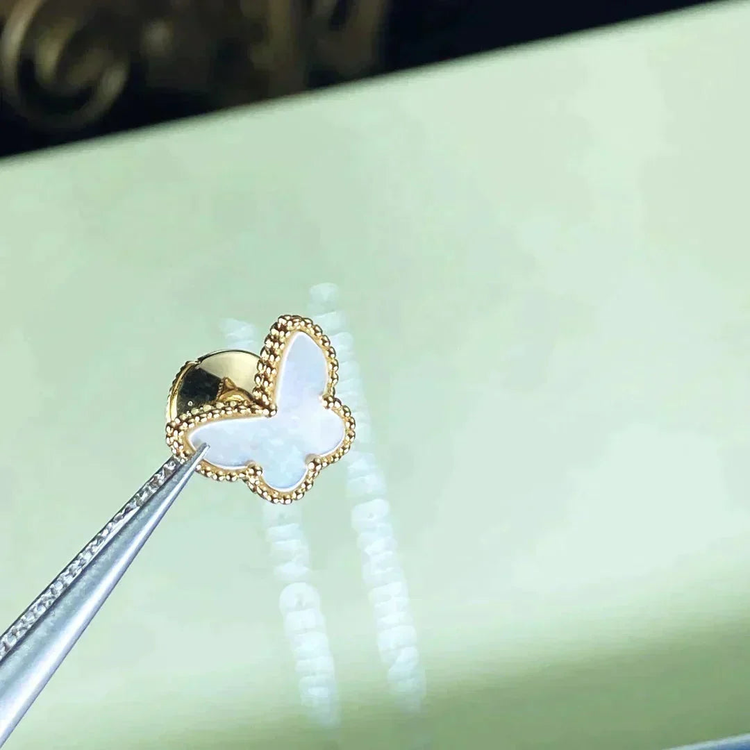 {
  "Elowen jewelsry": "Elowen ジュエリー",
  "SWEET BUTTERFLY MOP EARSTUDS": "スウィートバタフライ MOP ピアス"
}