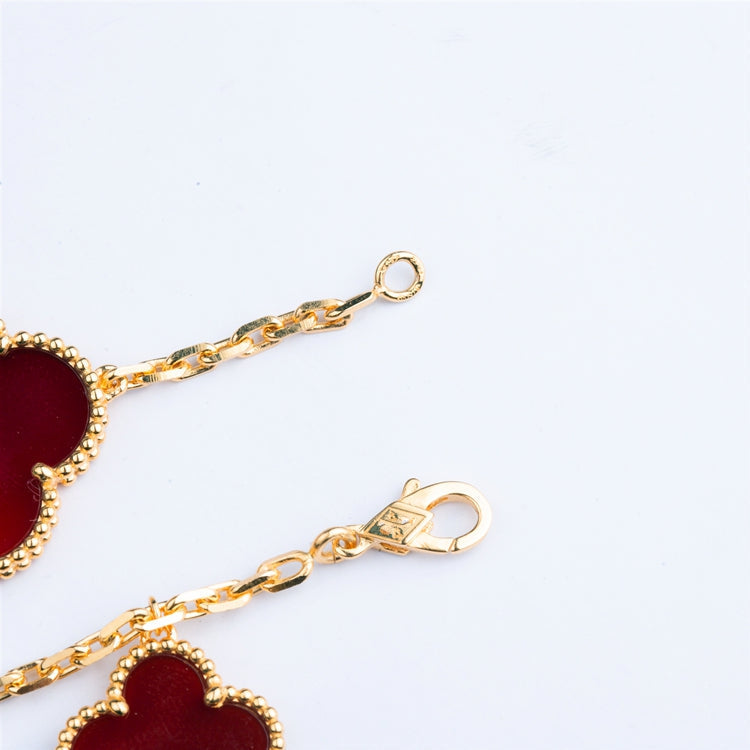 {
  "Elowen jewelsry": "Elowen ジュエリー",
  "CLOVER BRACELET 5 MOTIFS CARNELIAN TIGER EYE": "クローバーブレスレット 5モチーフ カーネリアン タイガーアイ"
}