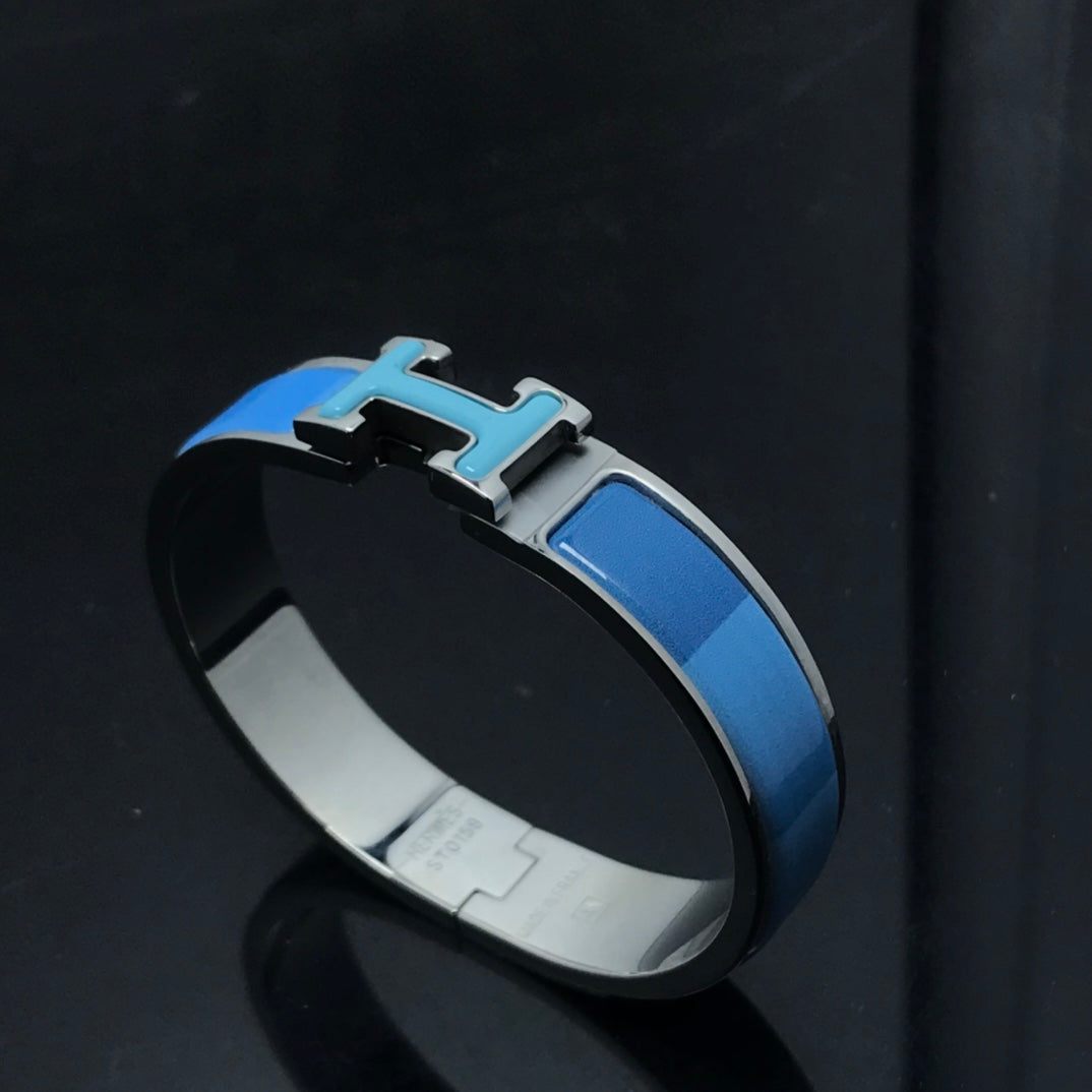 {
  "Elowen jewelsry": "Elowen Schmuck",
  "H BRACELET BLUE RAINBOW CERAMIC": "H-ARMBAND BLAUER REGENBOGEN KERAMIK"
}