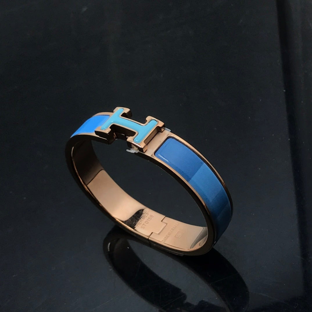{
  "Elowen jewelsry": "Elowen Schmuck",
  "H BRACELET BLUE RAINBOW CERAMIC": "H-ARMBAND BLAUER REGENBOGEN KERAMIK"
}