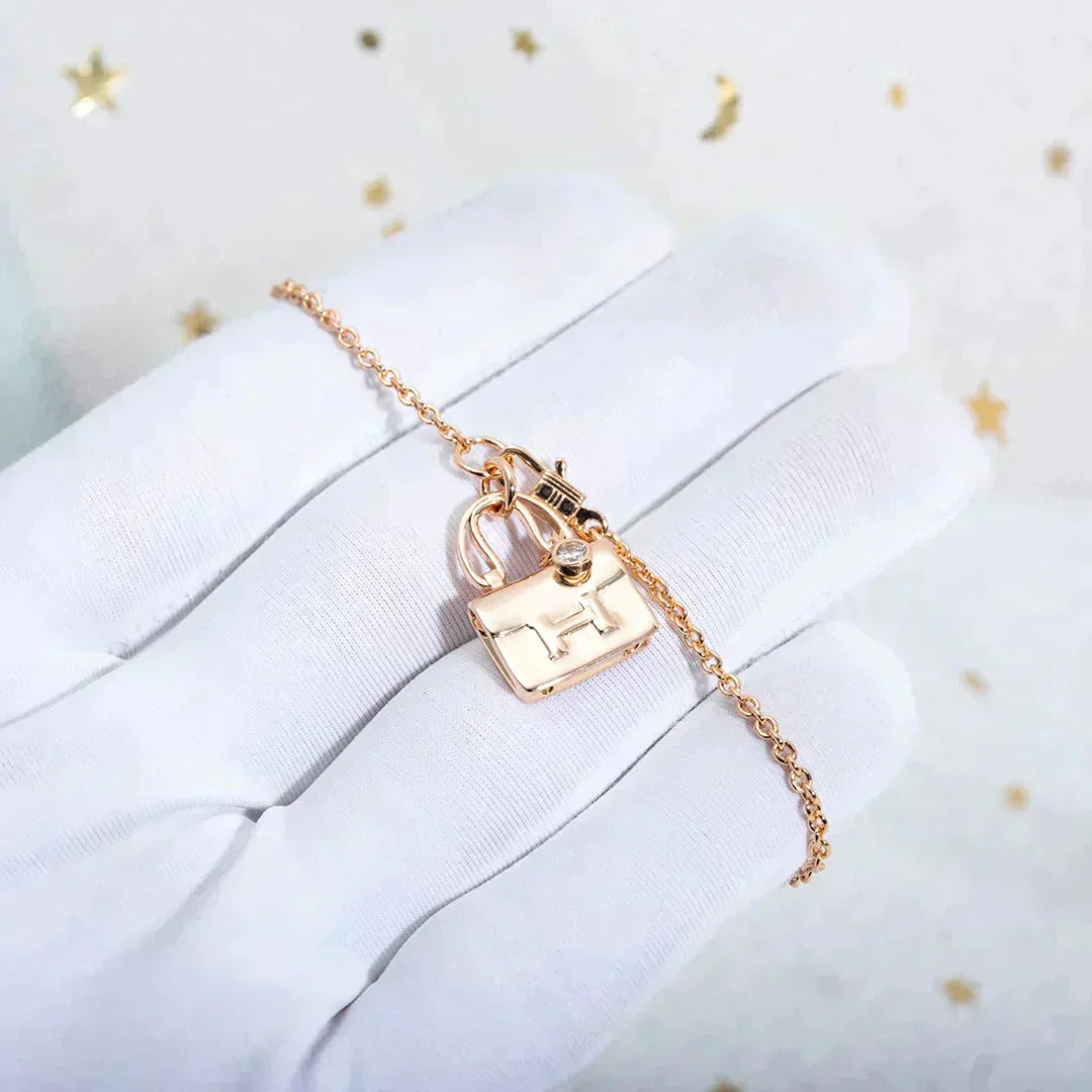 {
  "Elowen jewelsry": "Elowen Schmuck",
  "AMULETTE PEDANT ROSE GOLD NECKLACE": "AMULETTE ANHÄNGER ROSÉGOLD HALSKETTE"
}