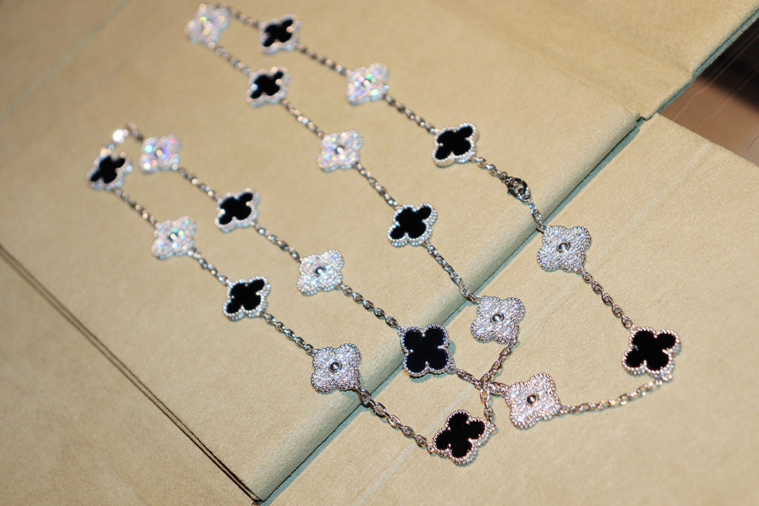 {
  "Elowen jewelsry": "Elowen ジュエリー",
  "CLOVER 20 MOTIFS ONYX DIAMOND SILVER": "クローバー 20モチーフ オニキス ダイヤモンド シルバー"
}