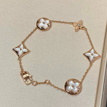 {
  "Elowen jewelsry": "Elowen Schmuck",
  "STAR AND SUN 5 MOTIF MOP PINK GOLD BRACELET": "ARMBAND MIT 5 STERN- UND SONNEN-MOTIVEN AUS PERLMUTT UND ROSÉGOLD"
}