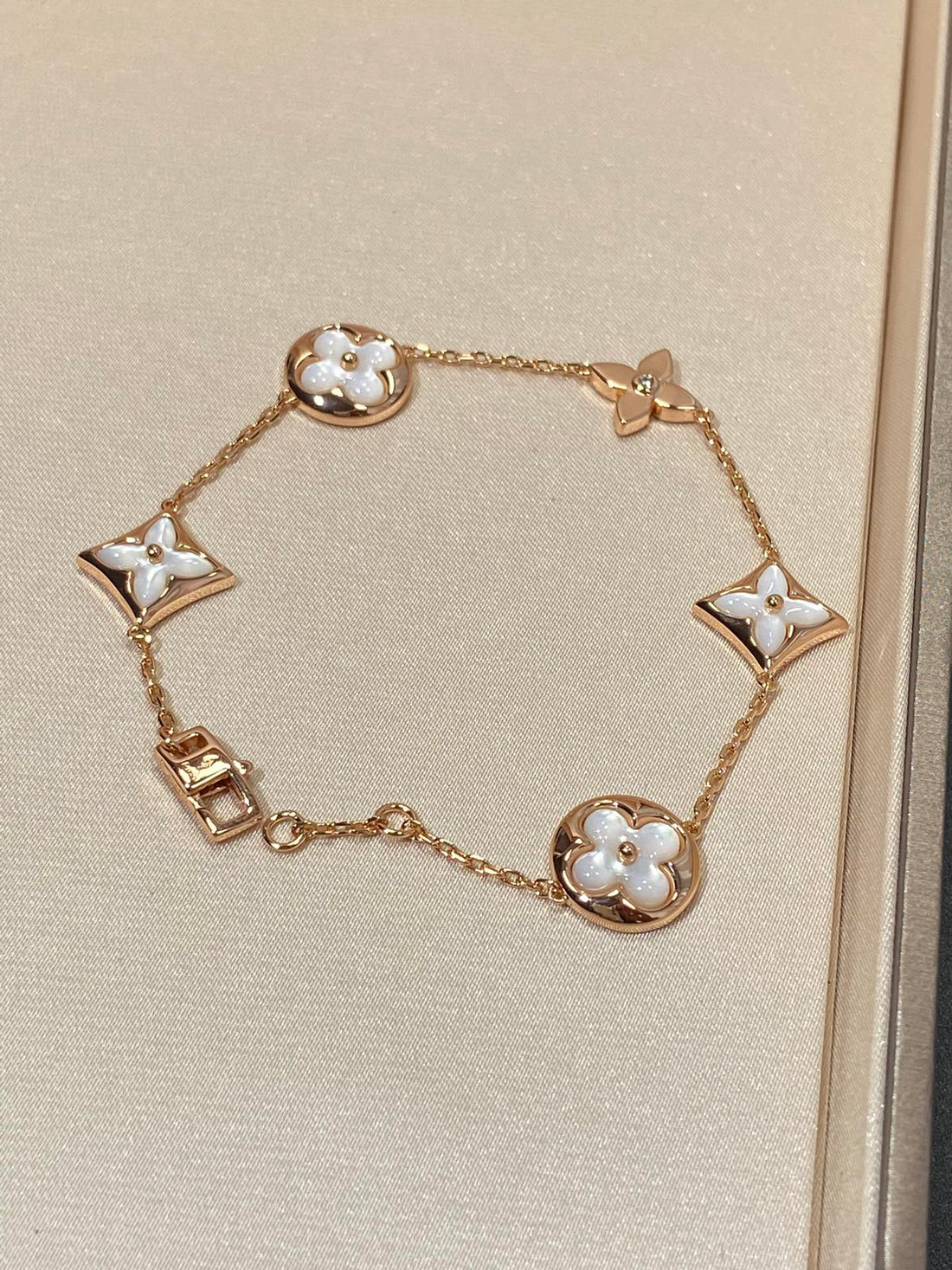 [Elowen jewelsry ]STAR AND SUN 5 MOTIF MOP PINK GOLD BRACELET