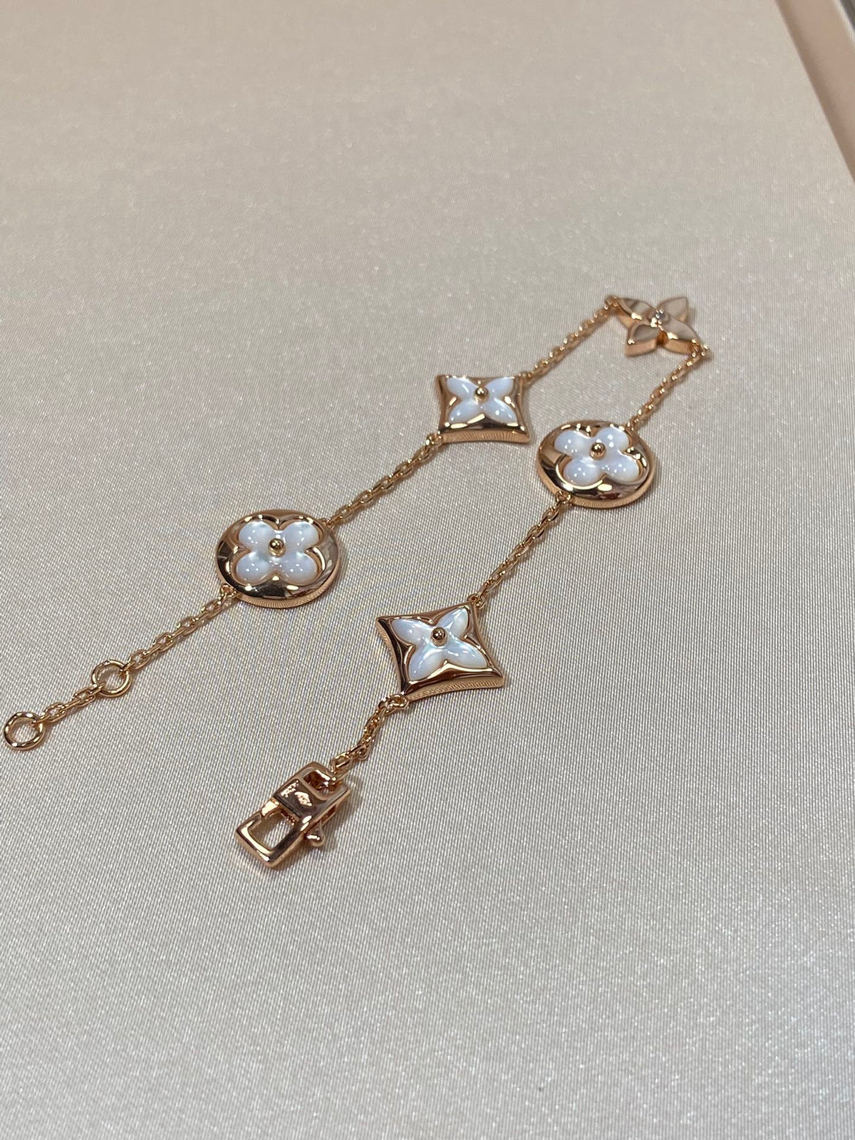 {
  "Elowen jewelsry": "Elowen Schmuck",
  "STAR AND SUN 5 MOTIF MOP PINK GOLD BRACELET": "ARMBAND MIT 5 STERN- UND SONNEN-MOTIVEN AUS PERLMUTT UND ROSÉGOLD"
}