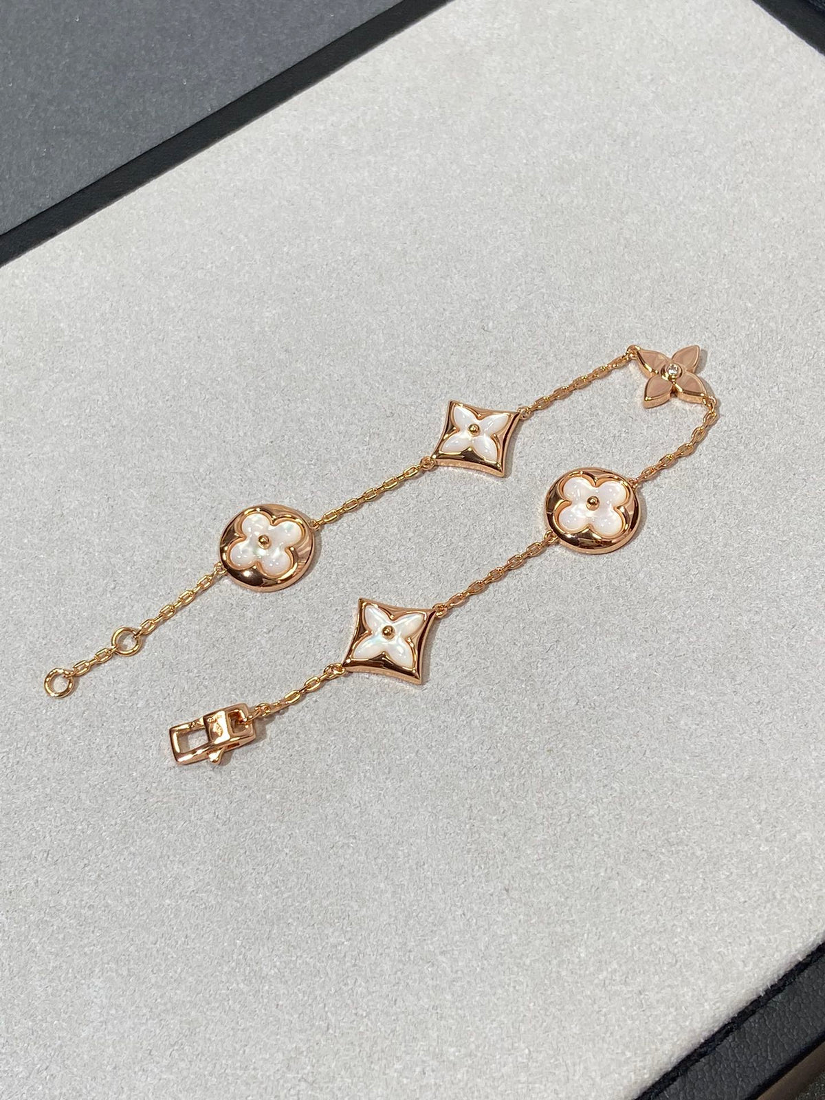 {
  "Elowen jewelsry": "Elowen Schmuck",
  "STAR AND SUN 5 MOTIF MOP PINK GOLD BRACELET": "ARMBAND MIT 5 STERN- UND SONNEN-MOTIVEN AUS PERLMUTT UND ROSÉGOLD"
}