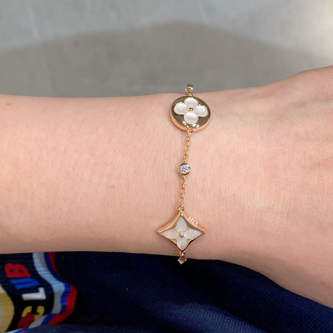 [Elowen jewelsry ]STAR AND SUN 4 MOTIF WHITE MOP PINK GOLD BRACELET