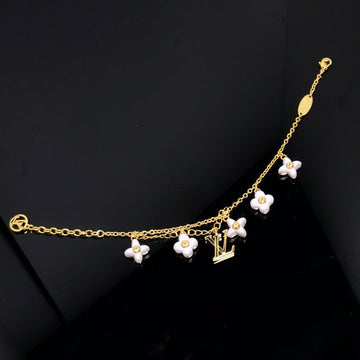 {
  "Elowen jewelsry": "Elowen Schmuck",
  "LOGO 6 MOTIF STAR AND SUN GOLD BRACELET": "GOLDARMBAND MIT 6 STERN- UND SONNENMOTIVEN"
}