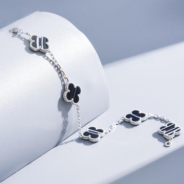 [Elowen Schmuck] CLOVER ARMBAND MIT 5 MOTIVEN AUS GEÄDERTEM ONYX, SILBER