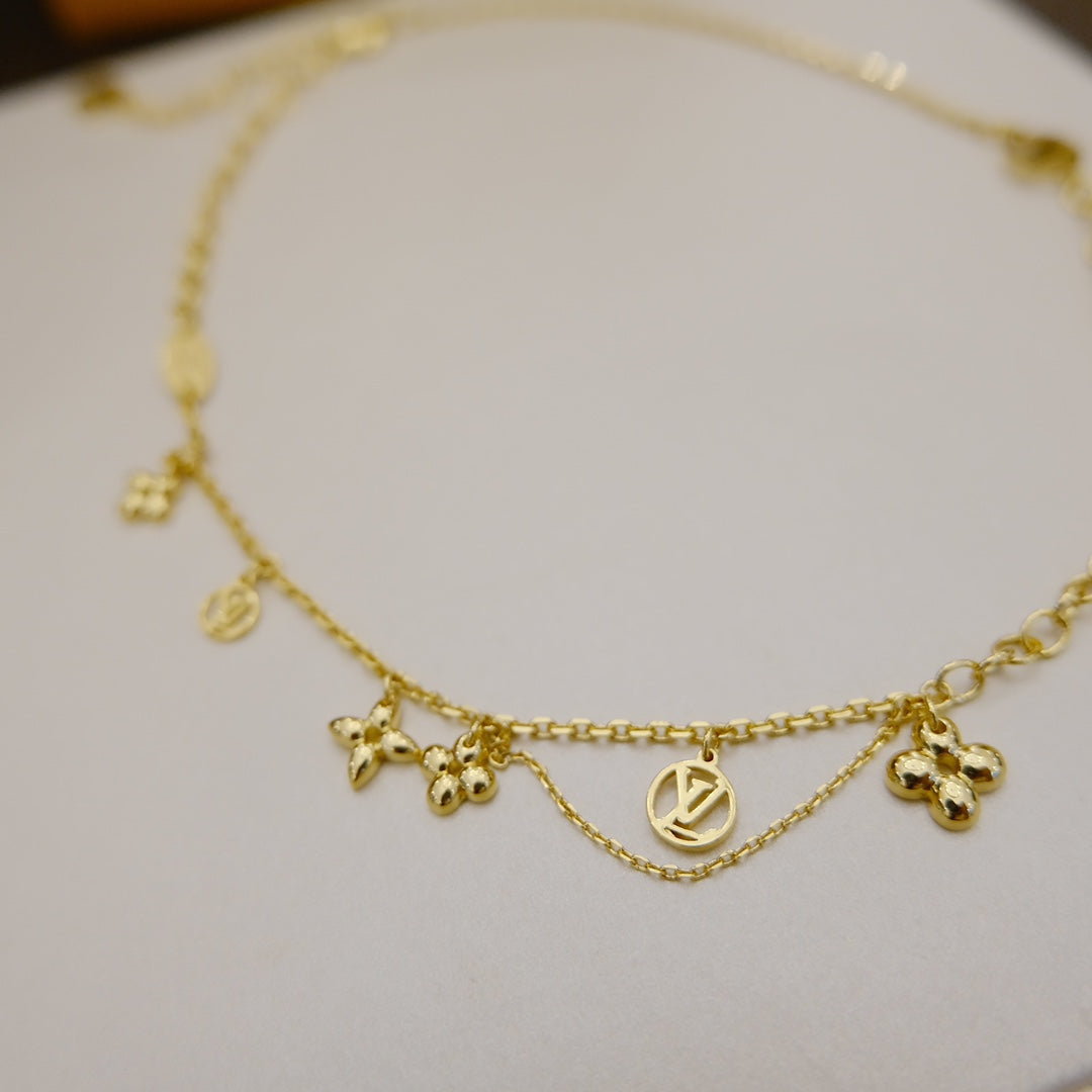 {
  "Elowen jewelsry": "Elowen ジュエリー",
  "BLOOMING SUPPLE NECKLACE BRASS": "ブルーミング サプル ネックレス ブラス"
}