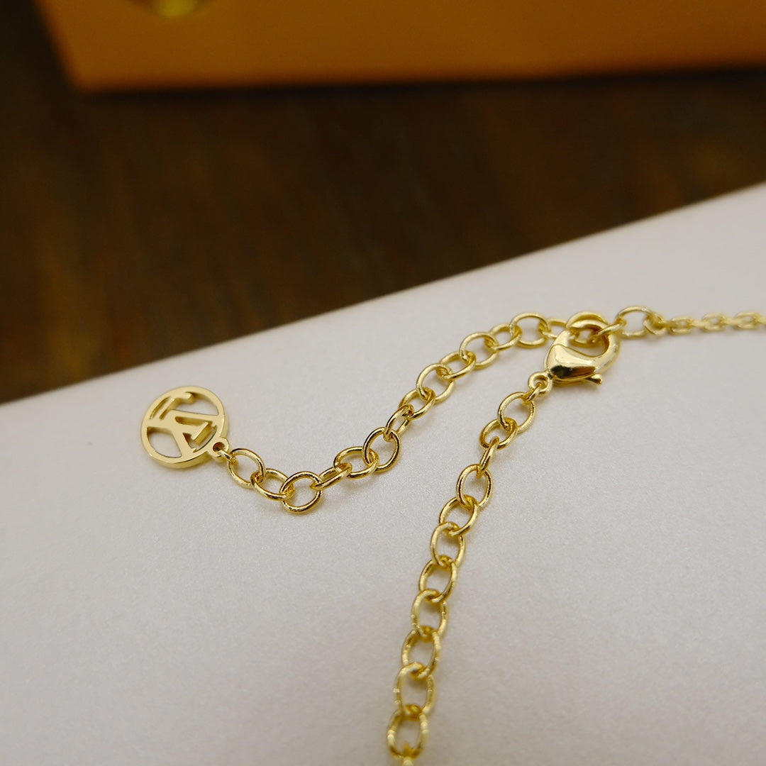 {
  "Elowen jewelsry": "Elowen ジュエリー",
  "BLOOMING SUPPLE NECKLACE BRASS": "ブルーミング サプル ネックレス ブラス"
}