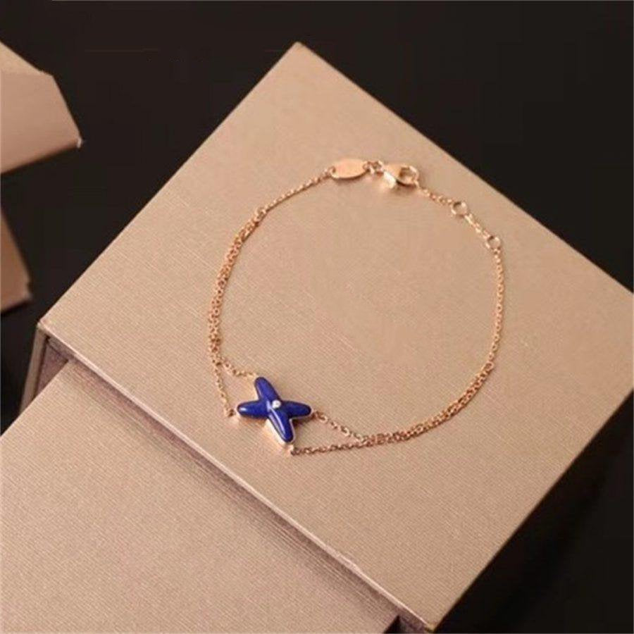 [Elowen jewelsry ]Hollow Design Four-Leaf Clover Flower Shape Bracelet