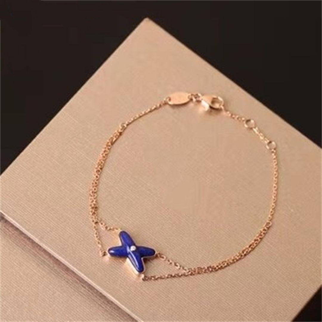 [Elowen jewelsry ]Hollow Design Four-Leaf Clover Flower Shape Bracelet