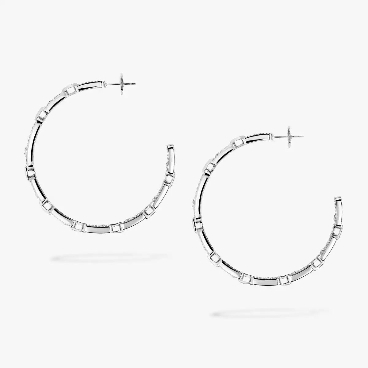 {
  "Elowen jewelsry": "Elowen Schmuck",
  "Move Link Diamond Hoop Earrings": "Move Link Diamant-Creolen"
}