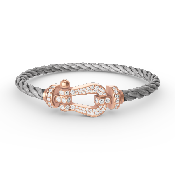 {
  "Elowen jewelsry": "Elowen Schmuck",
  "FORCE LARGE HORSESHOE FULL DIAMOND BRACELET ROSE GOLD": "FORCE GROSSES HUFEISEN-ARMBAND MIT VOLLBESATZ AUS DIAMANTEN IN ROSÉGOLD"
}