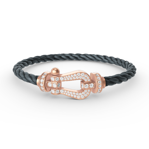 {
  "Elowen jewelsry": "Elowen Schmuck",
  "FORCE LARGE HORSESHOE FULL DIAMOND BRACELET ROSE GOLD": "FORCE GROSSES HUFEISEN-ARMBAND MIT VOLLBESATZ AUS DIAMANTEN IN ROSÉGOLD"
}