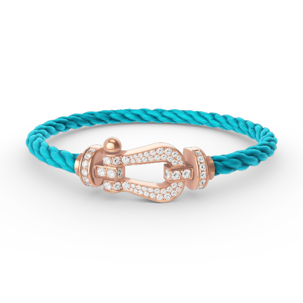 {
  "Elowen jewelsry": "Elowen Schmuck",
  "FORCE LARGE HORSESHOE FULL DIAMOND BRACELET ROSE GOLD": "FORCE GROSSES HUFEISEN-ARMBAND MIT VOLLBESATZ AUS DIAMANTEN IN ROSÉGOLD"
}