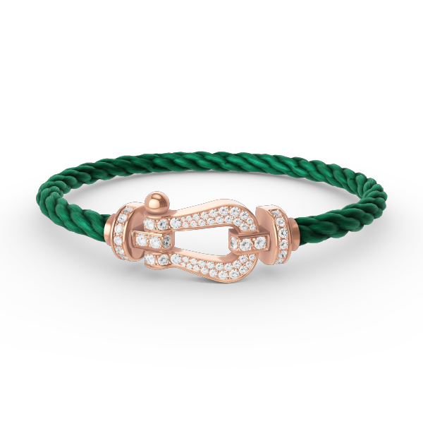 {
  "Elowen jewelsry": "Elowen Schmuck",
  "FORCE LARGE HORSESHOE FULL DIAMOND BRACELET ROSE GOLD": "FORCE GROSSES HUFEISEN-ARMBAND MIT VOLLBESATZ AUS DIAMANTEN IN ROSÉGOLD"
}