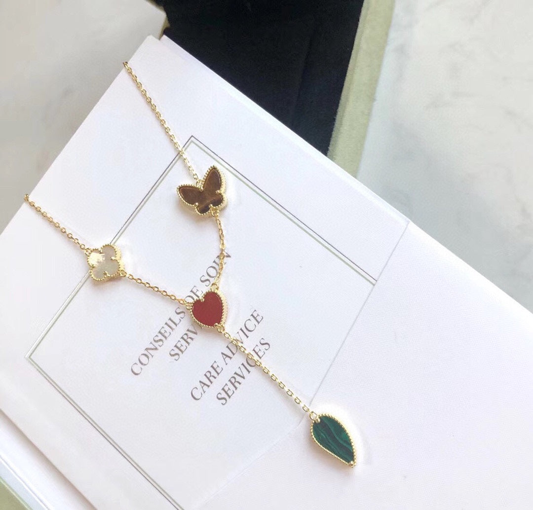 {
  "Elowen jewelsry": "Elowen ジュエリー",
  "LUCKY SPRING 4 MOTIFS ROSE GOLD NECKLACE": "LUCKY SPRING 4モチーフ ローズゴールド ネックレス"
}